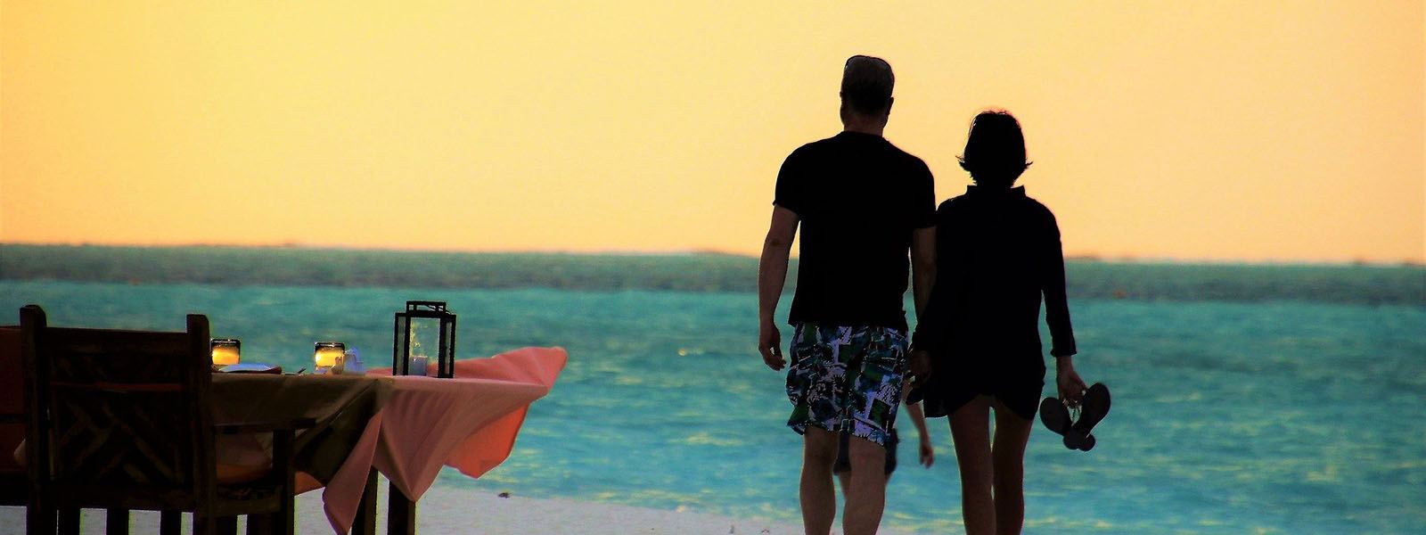 Couple watching the sunset on Uganda honeymoon safaris